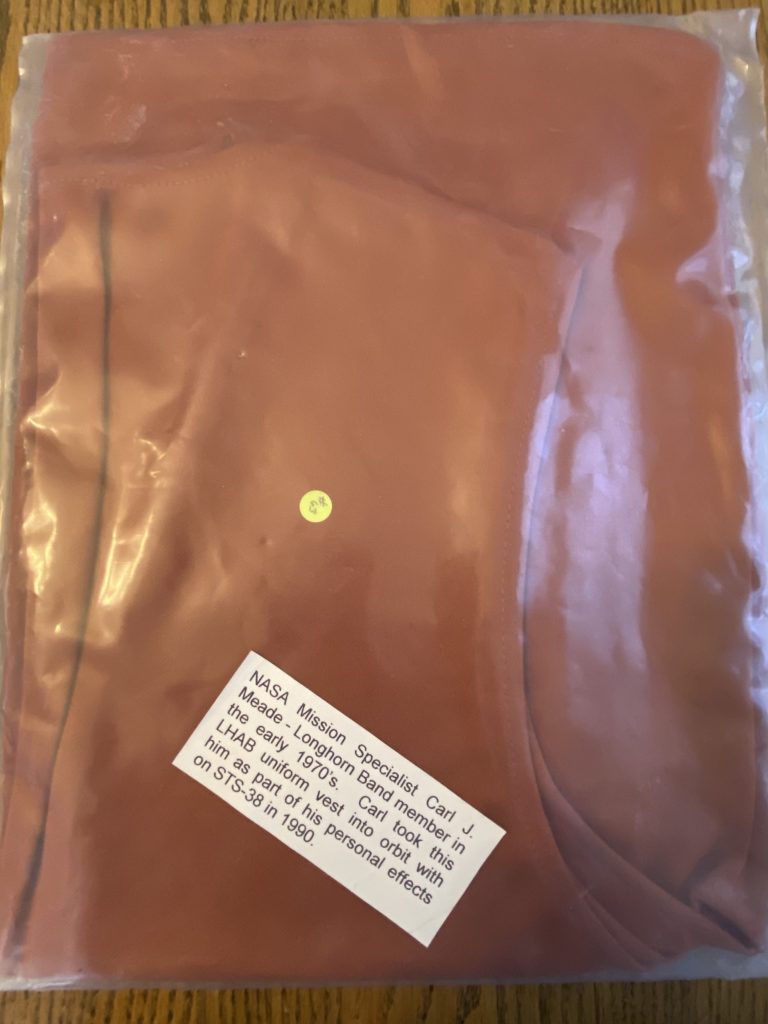 The burnt-orange LHAB vest photographed aboard the Space Shuttle Atlantis during mission STS-38