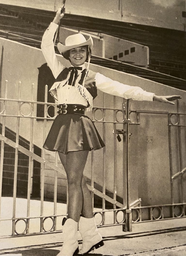Emma Lea King in the 1966 orange fringed Texas Stars uniform with studded belt