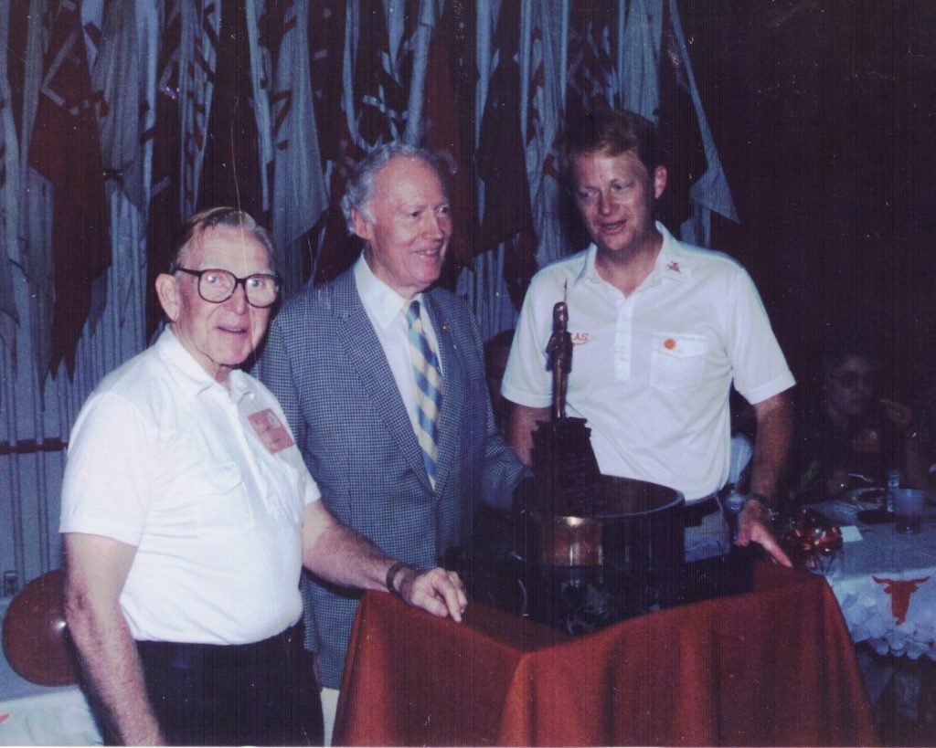 Moton Crockett, Louis Sudler, and Glenn Richter with the Sudler Trophy in the LHB Band Hall