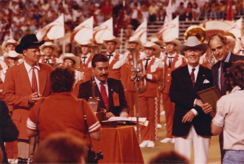 On-field Sudler Trophy presentation to Director Glenn Richter, with Louis Sudler wearing his gift Stetson