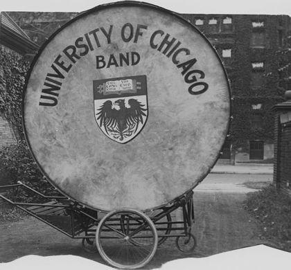 Round University of Chicago bass drum head with the Longhorn Band on the reverse