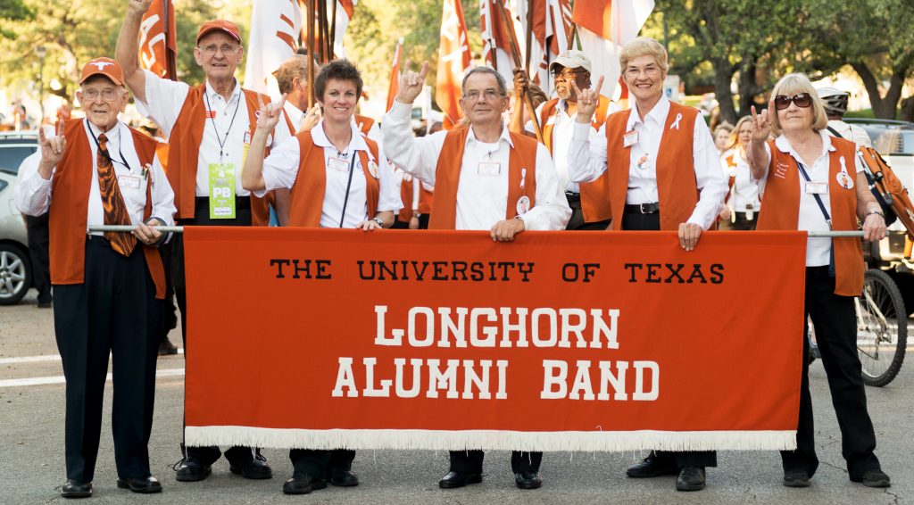 Longhorn Alumni Band members on the field at DKR-Texas Memorial Stadium